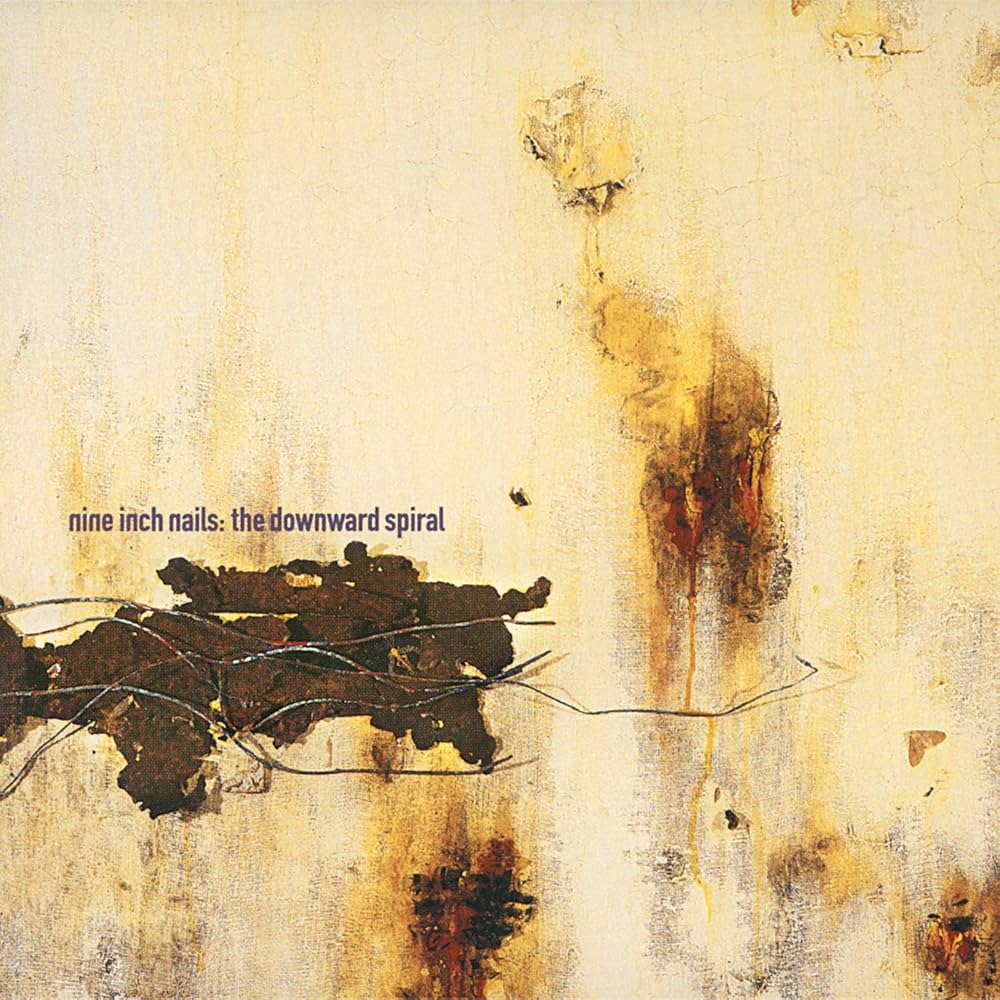 Cover de l'album The downward spiral du groupe Nine Inch Nails